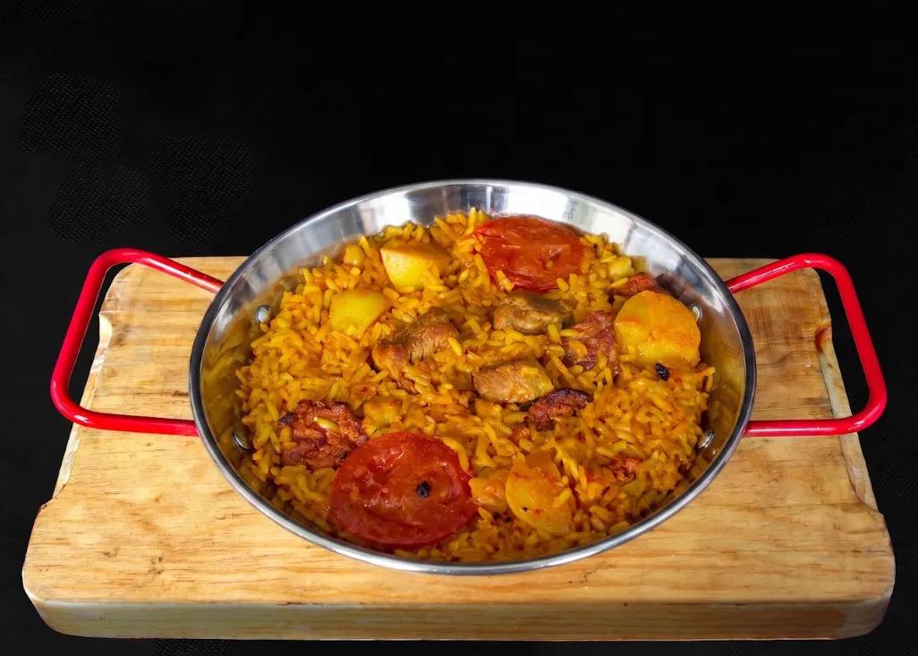 Popular item de Puerta Palma: Arroz al Horno en Paella
