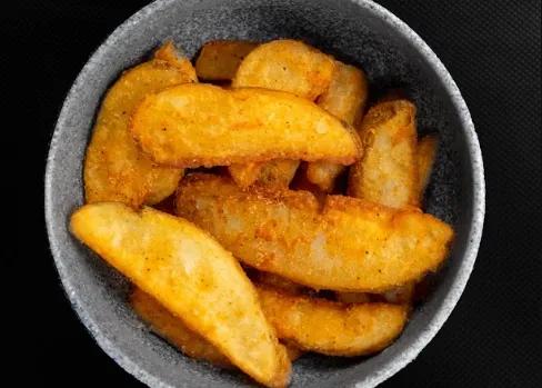 Popular item de Puerta Palma: Papas Gajo