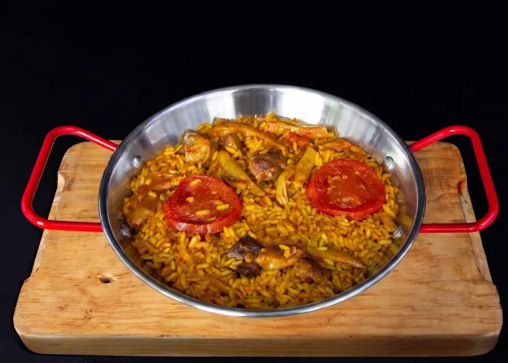 Popular item de Puerta Palma: Arroz con Secreto y Setas
